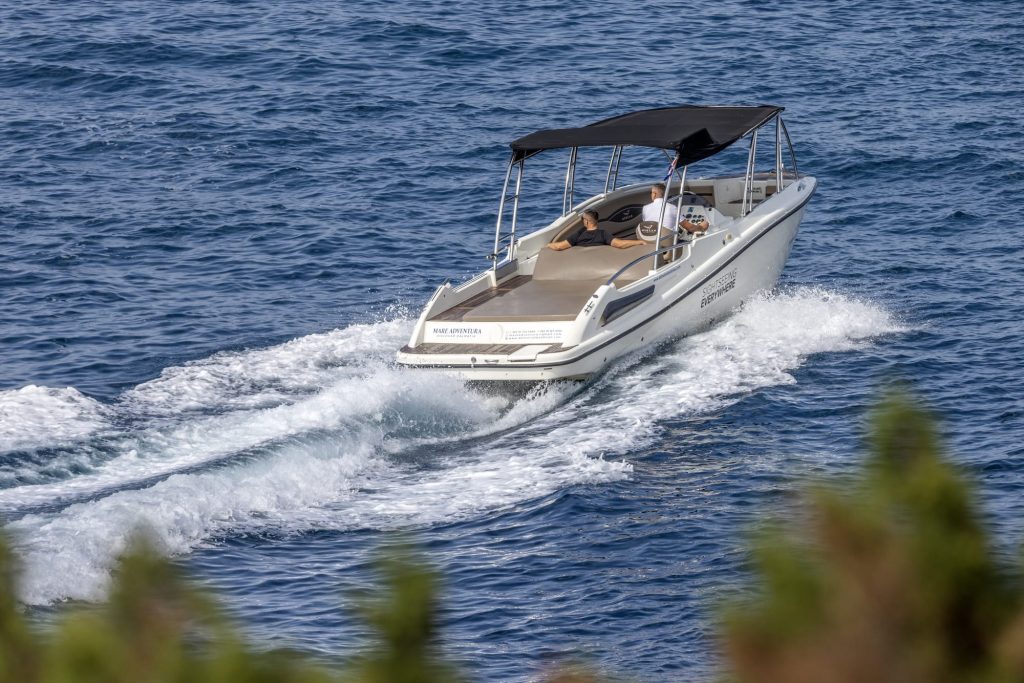 DalmatianBoatTrips crew and boat at sea